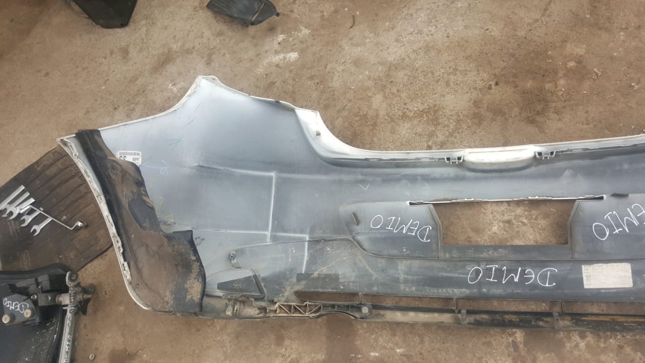 PARACHOQUES POSTERIOR MAZDA DEMIO 2007 AL 2014